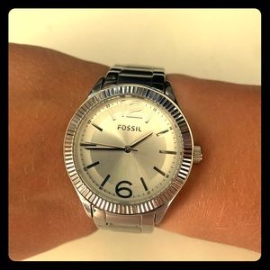 Women’s silver fossil watch.